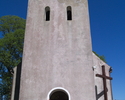 Zdjęcie przedstawia wieżę kościoła pw. Chrystusa Króla w Pieńkowie.                                                                                                                                     