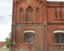 Zdjęcie przedstawia dawny folwark w Witnicy. Na pierwszym planie widać fragment budynku gospodarczego.                                                                                                  
