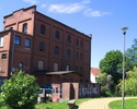 Zdjęcie przedstawia budynek dawnego młyna wodnego w Darłowie.                                                                                                                                           