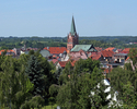 Zdjęcie przedstawia panoramę na starówkę w Połczynie-Zdroju. Widok od strony ulicy Nowej.                                                                                                               