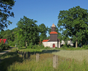 Zdjęcie przedstawia kościół w Słowieńsku od strony zachodniej.                                                                                                                                          