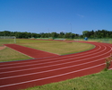 Zdjęcie przedstawia stadion sportowy im. Z. Galka w Postominie.                                                                                                                                         