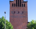 Zdjęcie przedstawia wieżę kościoła pw. św. Antoniego w Sławnie.                                                                                                                                         