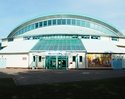 Zdjęcie przedstawia wejścia do hali Millenium w Kołobrzegu.                                                                                                                                             