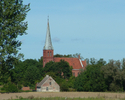 Zdjęcie przedstawia kościół filialny pw. Podwyższenia Krzyża Świętego.                                                                                                                                  